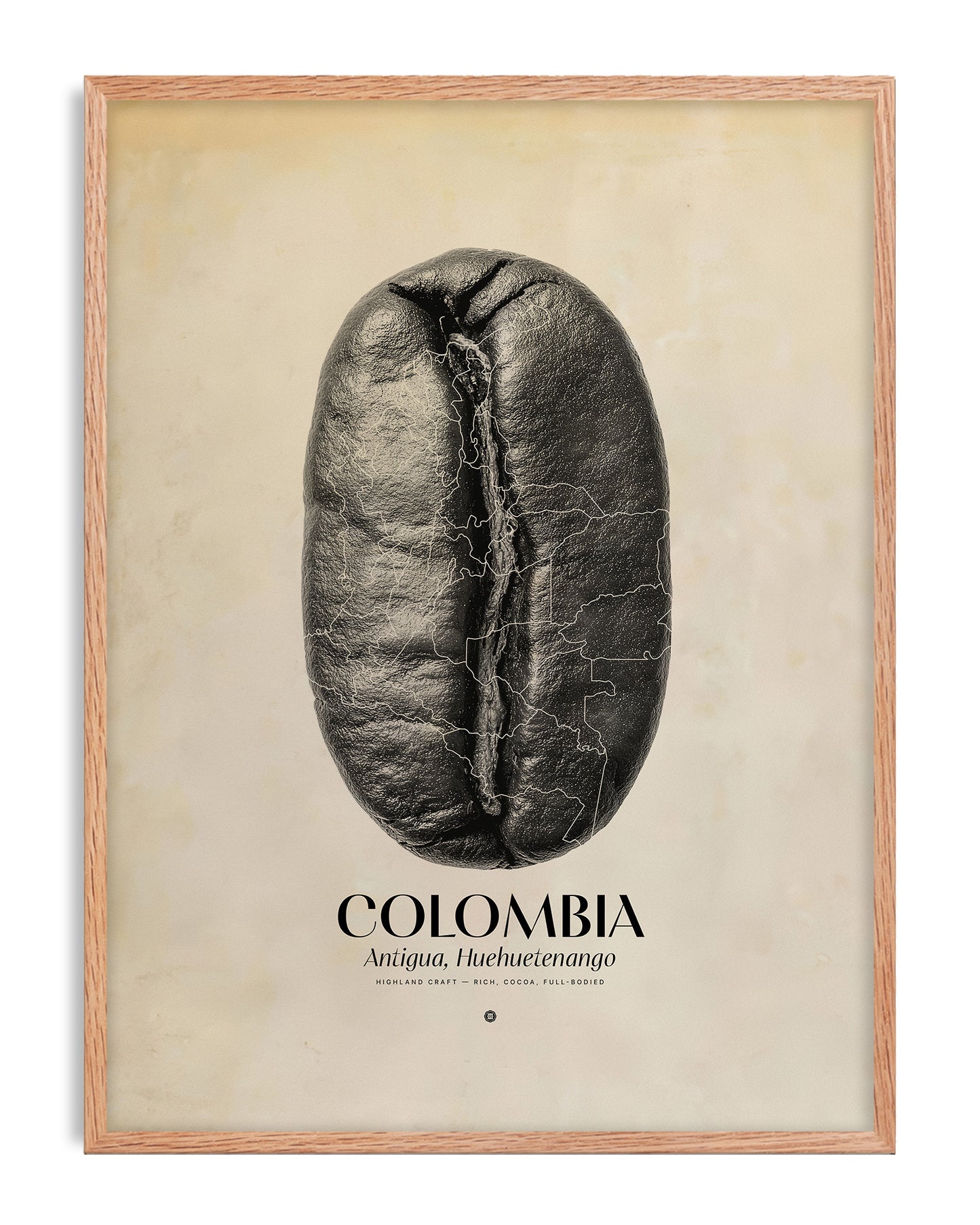 Oak-framed Colombia Antigua, Huehuetenango art print featuring a black coffee bean with map outlines.