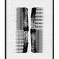 Black-framed abstract art print featuring two mirrored, distressed black comb-like forms on white.