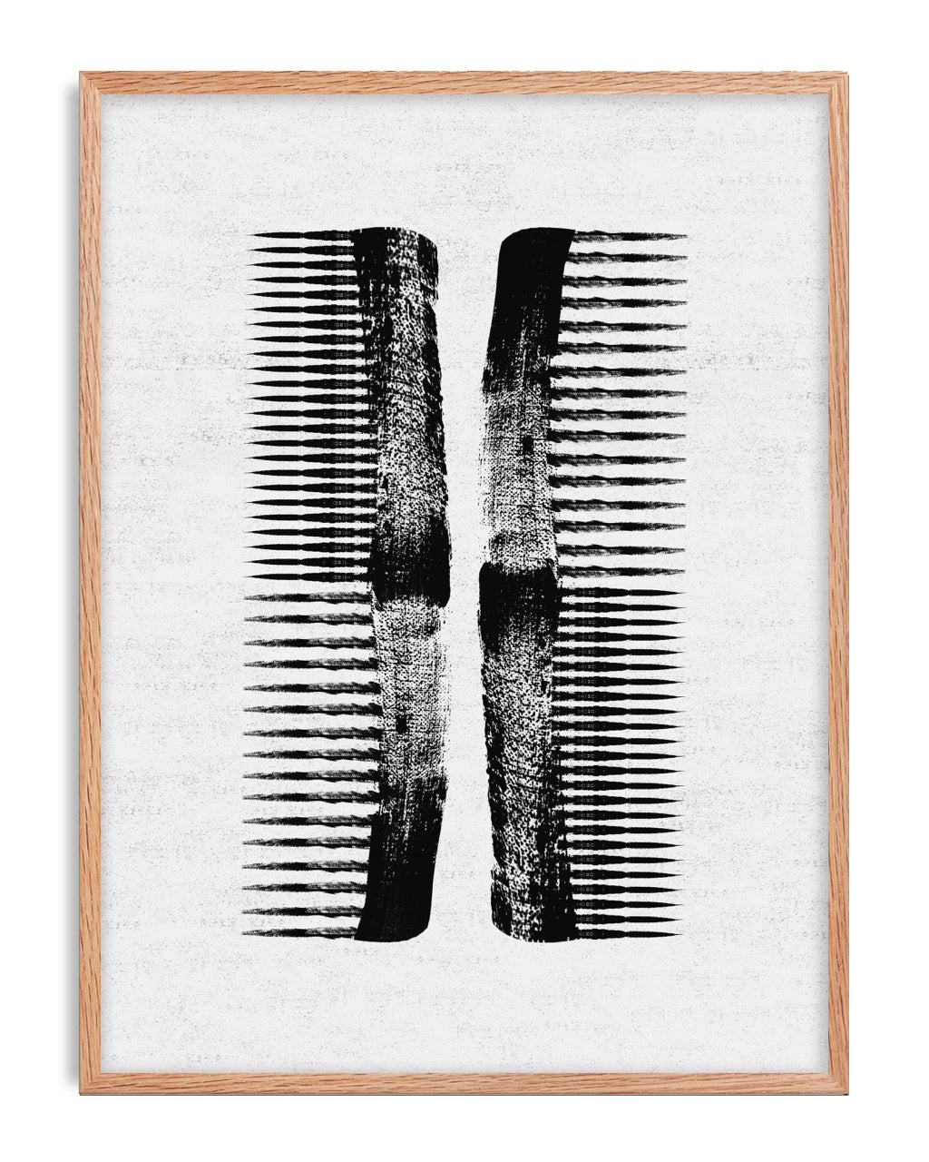 Oak-framed black abstract comb artwork on a textured white background.