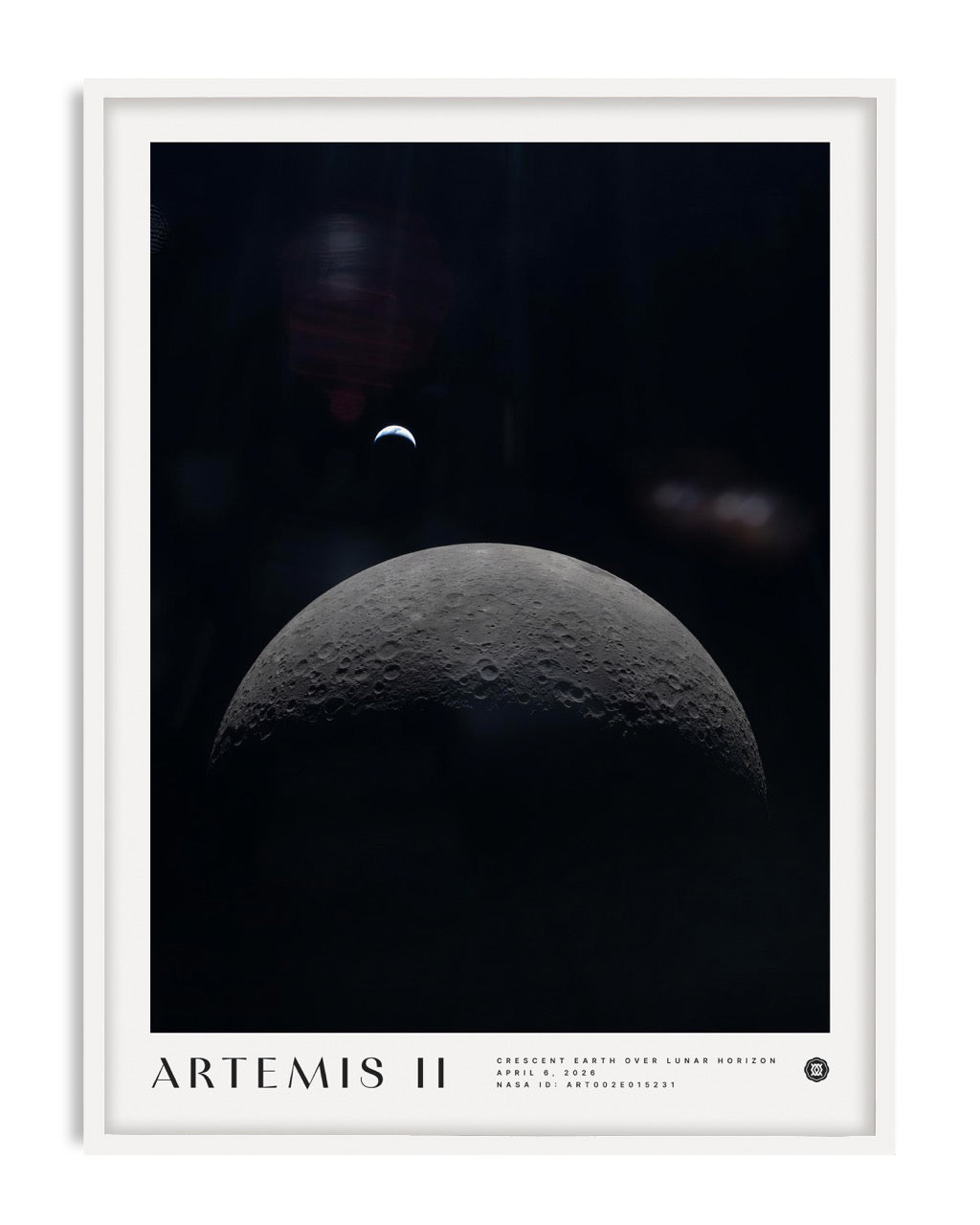 White-framed Artemis II art print showing a crescent Earth above the cratered lunar horizon.