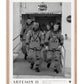 Oak-framed Artemis II crew art print featuring four astronauts in spacesuits walking out of a NASA building.