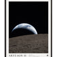 Black-framed Artemis II Earthset art print showing Earth rising above the cratered lunar surface against black space.