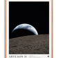 Oak-framed Artemis II Earthset art print showing a crescent Earth above the cratered lunar horizon.