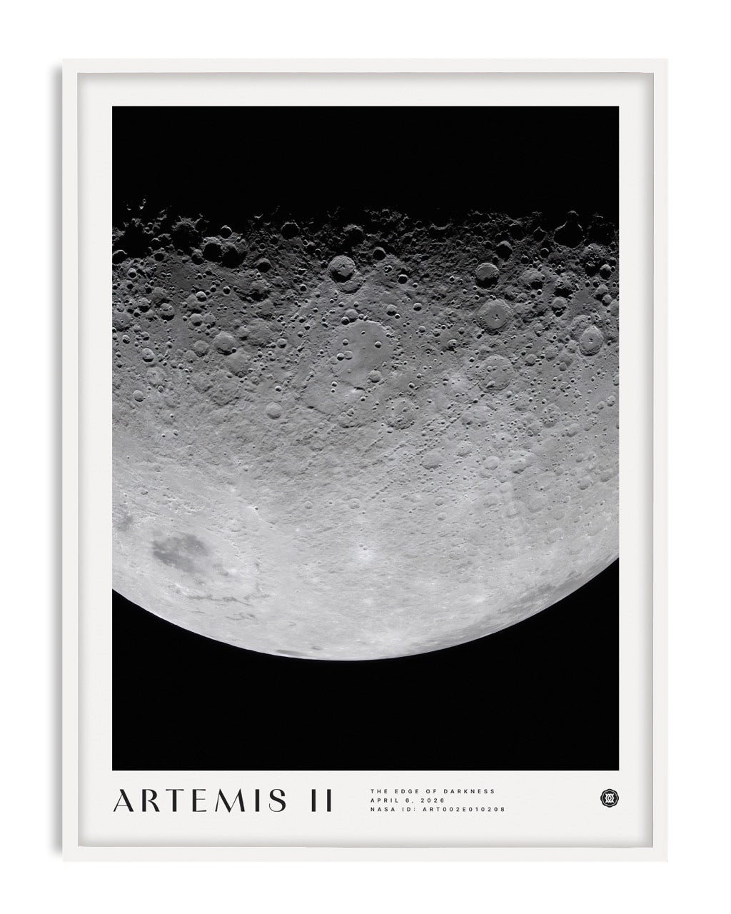 White-framed Artemis II art print featuring a detailed cratered lunar surface against black space.