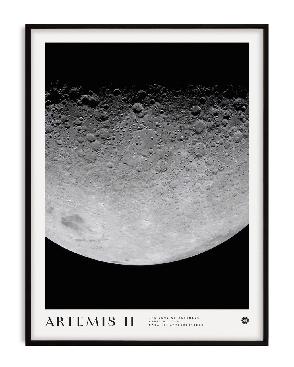 Black-framed Artemis II art print featuring a detailed cratered lunar surface against black space.