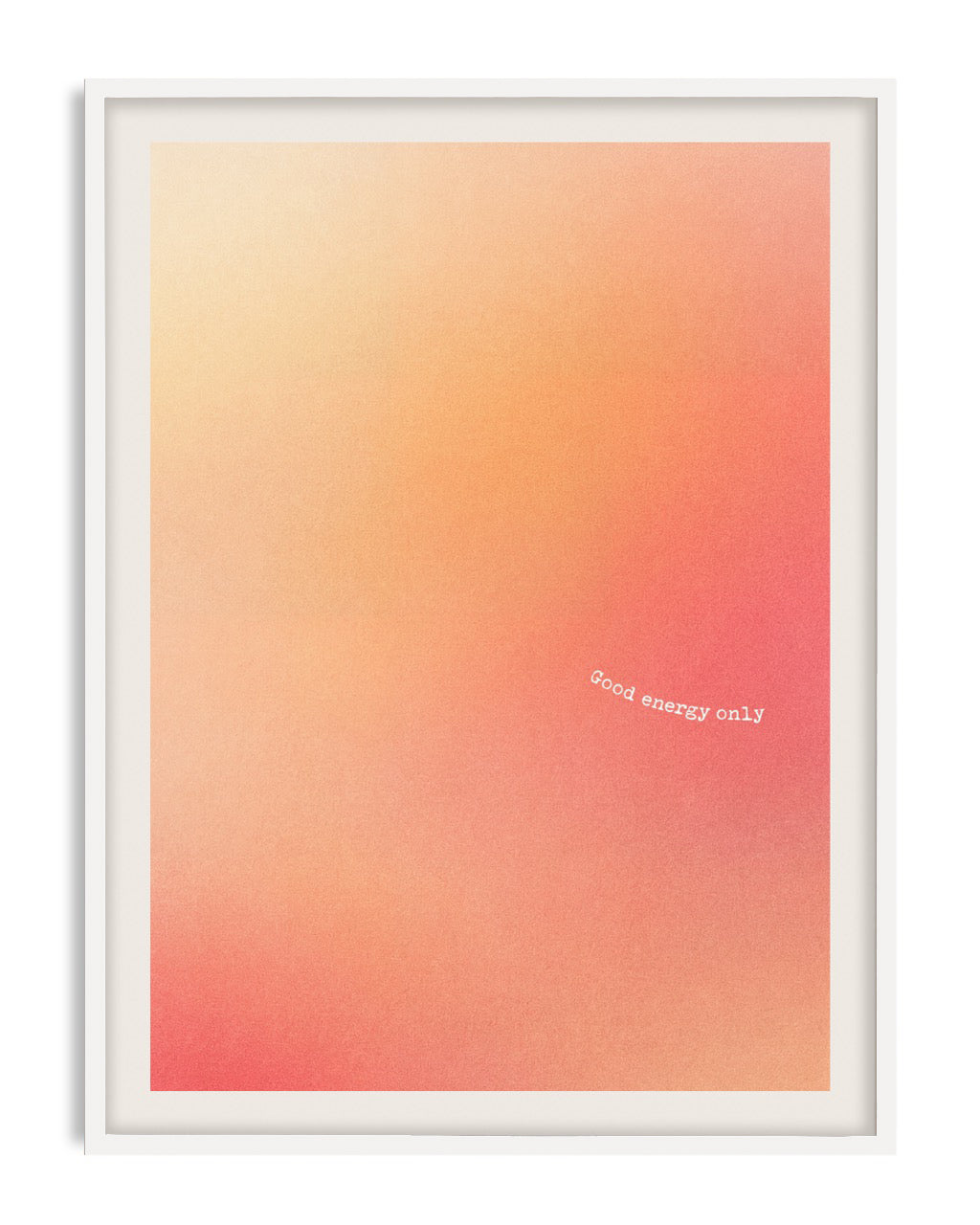 White-framed abstract art print with a peach-to-coral gradient and the white text “Good energy only.”