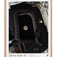 Oak-framed Artemis II Goodnight Moon art print showing the Moon through a spacecraft window surrounded by equipment.