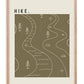 Oak-framed HIKE. artwork with white winding trails, streams, trees, rocks, and map symbols on olive green.