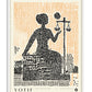 White-framed Lady Justice art print featuring a seated figure holding balanced scales over orange and black dot patterns.