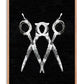 Oak-framed black and white artwork of three overlapping scissors on a textured black background.