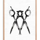 Oak-framed monochrome artwork of three overlapping scissors with circular handles.