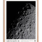 Oak-framed Artemis II art print featuring a black-and-white view of the Moon’s cratered surface against black space.