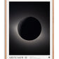 Oak-framed Artemis II eclipse artwork showing a dark celestial sphere surrounded by a faint glow.