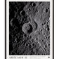 Black-framed Artemis II Shadows Across Vavilov Crater art print featuring a high-contrast view of the cratered lunar surface.
