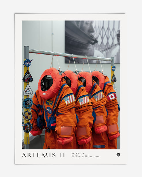 Unframed Artemis II art print showing five orange crew suits with NASA, United States, and Canadian patches.
