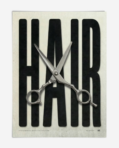 Unframed HAIR art print with oversized black lettering and open silver haircutting scissors.