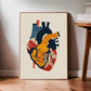 Framed abstract heart anatomy artwork in navy, golden yellow, red, and blue leaning against a wall.