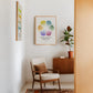 Oak-framed Feelings Wheel artwork displayed in an interior setting.