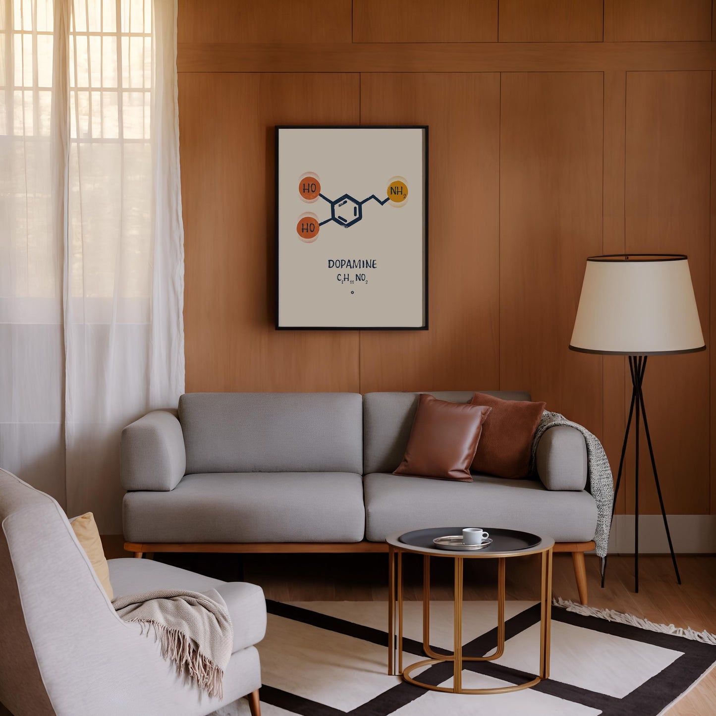 Black-framed dopamine molecular artwork displayed above a gray sofa on a wood-paneled living room wall.