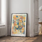 Large Black-framed Cerebrum in Bloom art print leaning on the floor beside a window and open doorway.