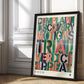 Black-framed colorful legal-themed artwork leaning against an ornate white paneled wall.