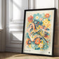 Black-framed Auris in Bloom ear and floral artwork leaning against a sunlit paneled wall.
