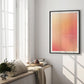 Black-framed Good energy only gradient artwork displayed on a sunlit wall beside tall windows
