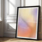 Black-framed pastel gradient art print reading “Focus on the journey, not the destination,” leaning in a sunlit paneled room.