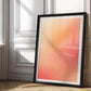 Black-framed Good energy only gradient artwork leaning against a sunlit paneled wall