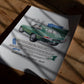Unframed 1961 Jaguar E-Type art print lying on a wooden floor in patterned sunlight.