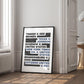Black-framed free speech legal cases typography art print leaning beside a window and open doorway.