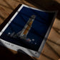 Unframed Artemis II rocket art print lying on a wooden table in patterned sunlight.