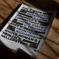 Unframed women's rights legal cases art print lying on a wooden table in dappled sunlight.