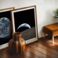 Oak-framed Artemis II Earthset artwork displayed in an interior setting.