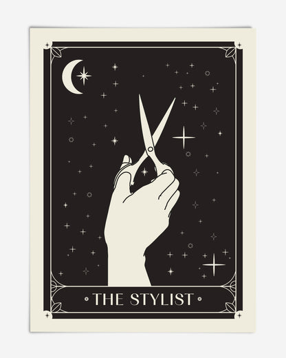 Unframed black-and-cream The Stylist art print featuring a hand holding scissors beneath a crescent moon and stars.