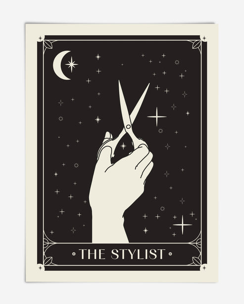 Unframed black-and-cream The Stylist art print featuring a hand holding scissors beneath a crescent moon and stars.
