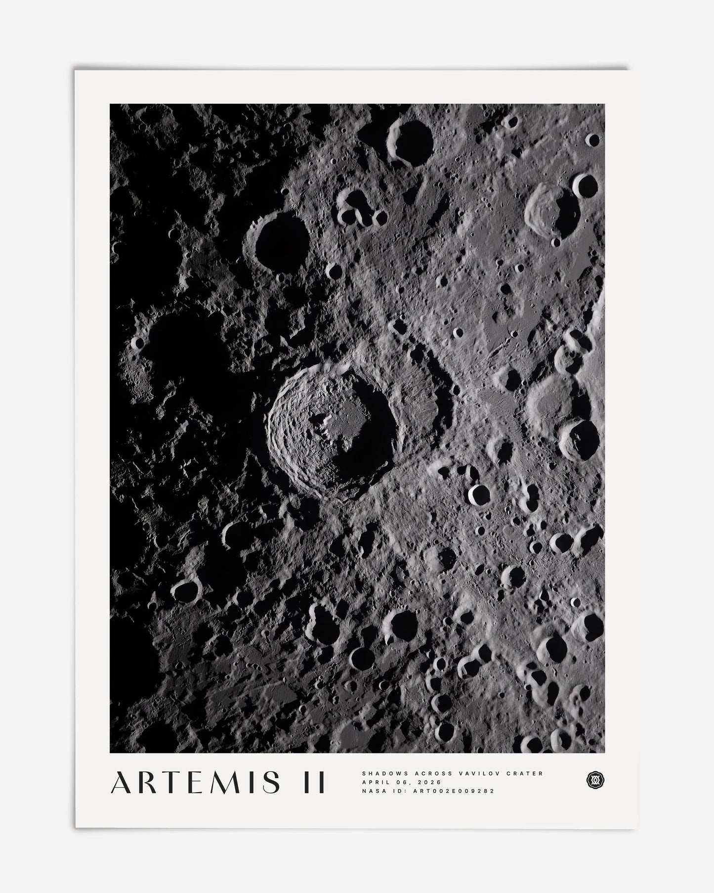 Unframed Artemis II Shadows Across Vavilov Crater art print featuring a high-contrast view of the cratered lunar surface.