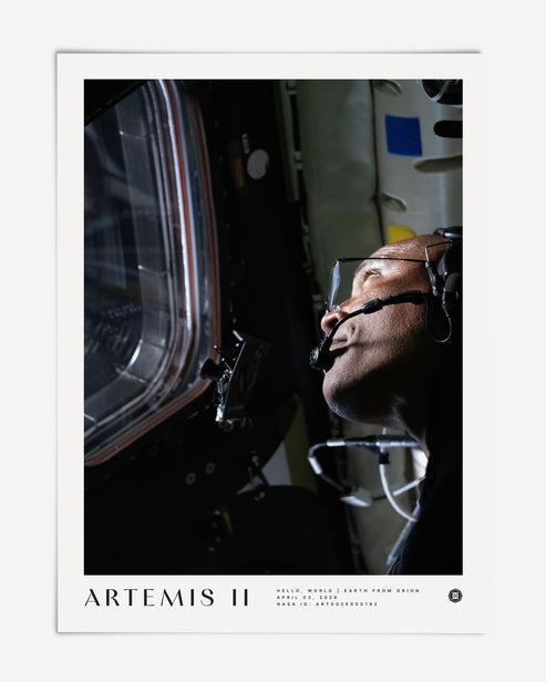 Unframed Artemis II art print showing a color portrait of an astronaut wearing a headset and looking through a spacecraft window.