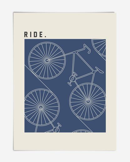 Unframed blue and cream bicycle pattern art print with the word “RIDE.”