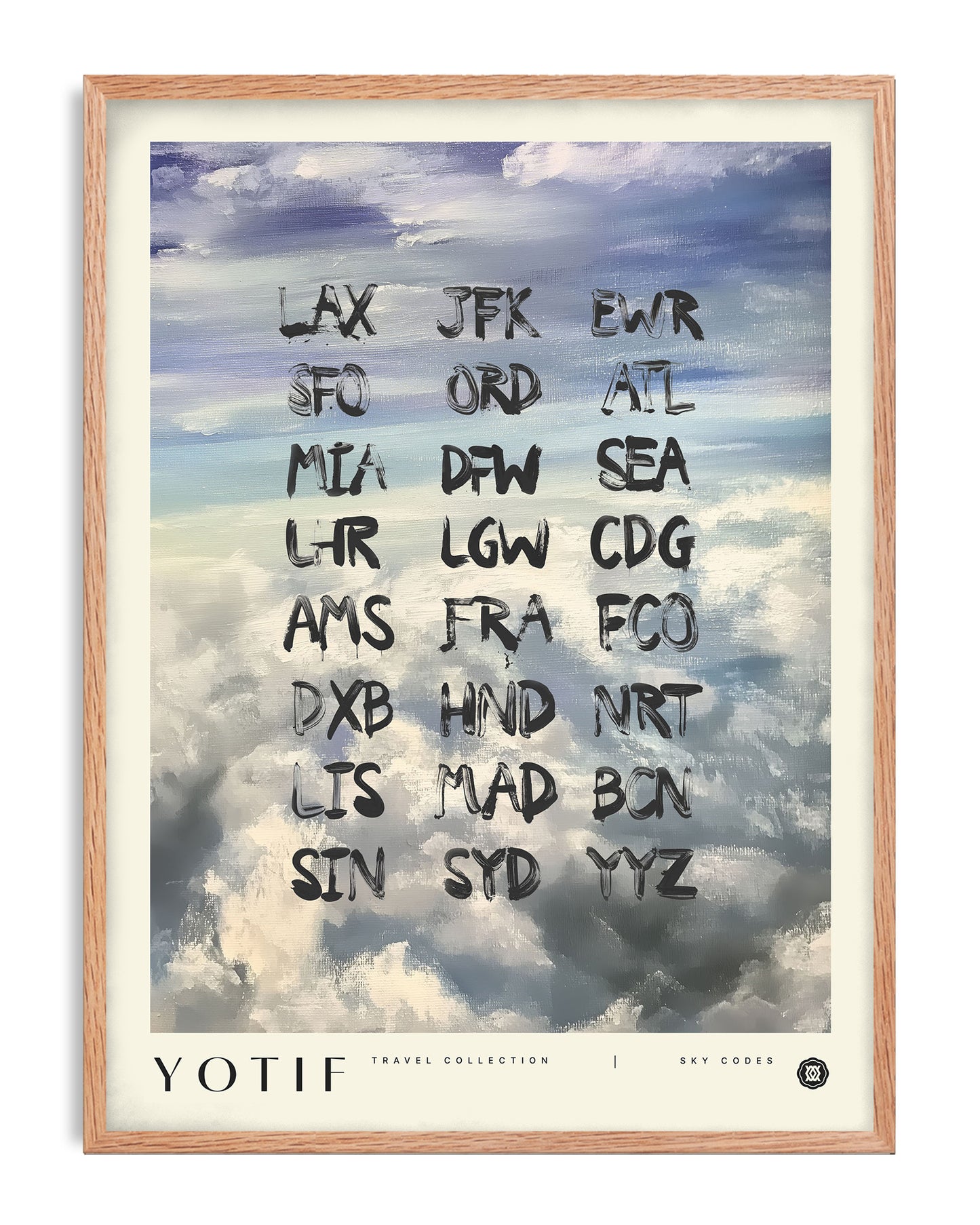 Oak-framed YOTIF Sky Codes art print featuring black airport abbreviations over blue, gray, and white painted clouds.